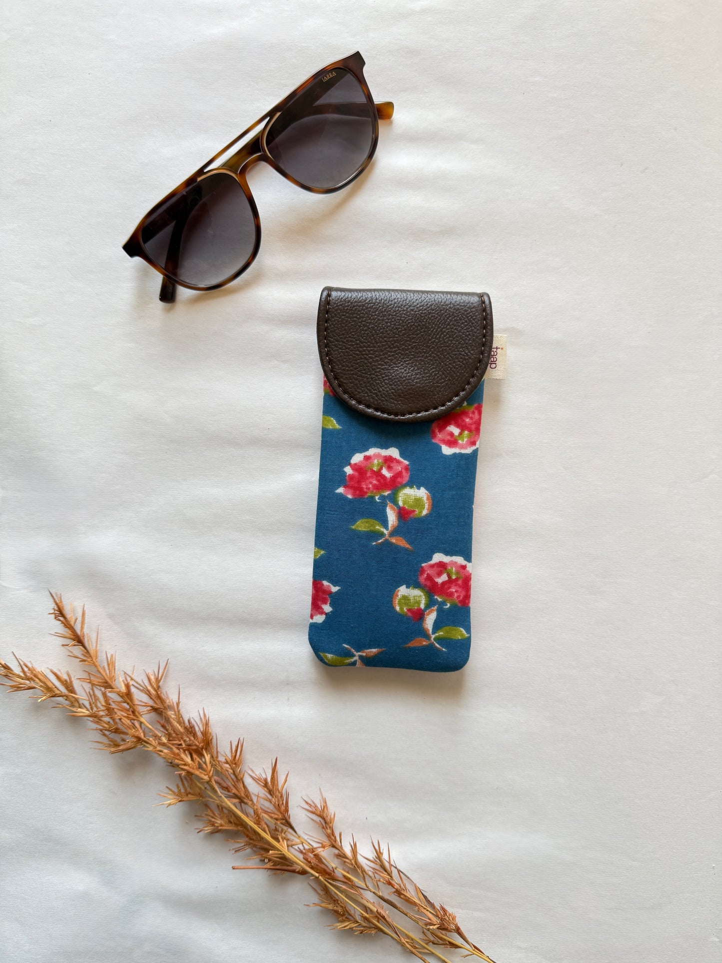 Indigo Rose Charm Sunglass Cover – Gentle Guard for Your Shades